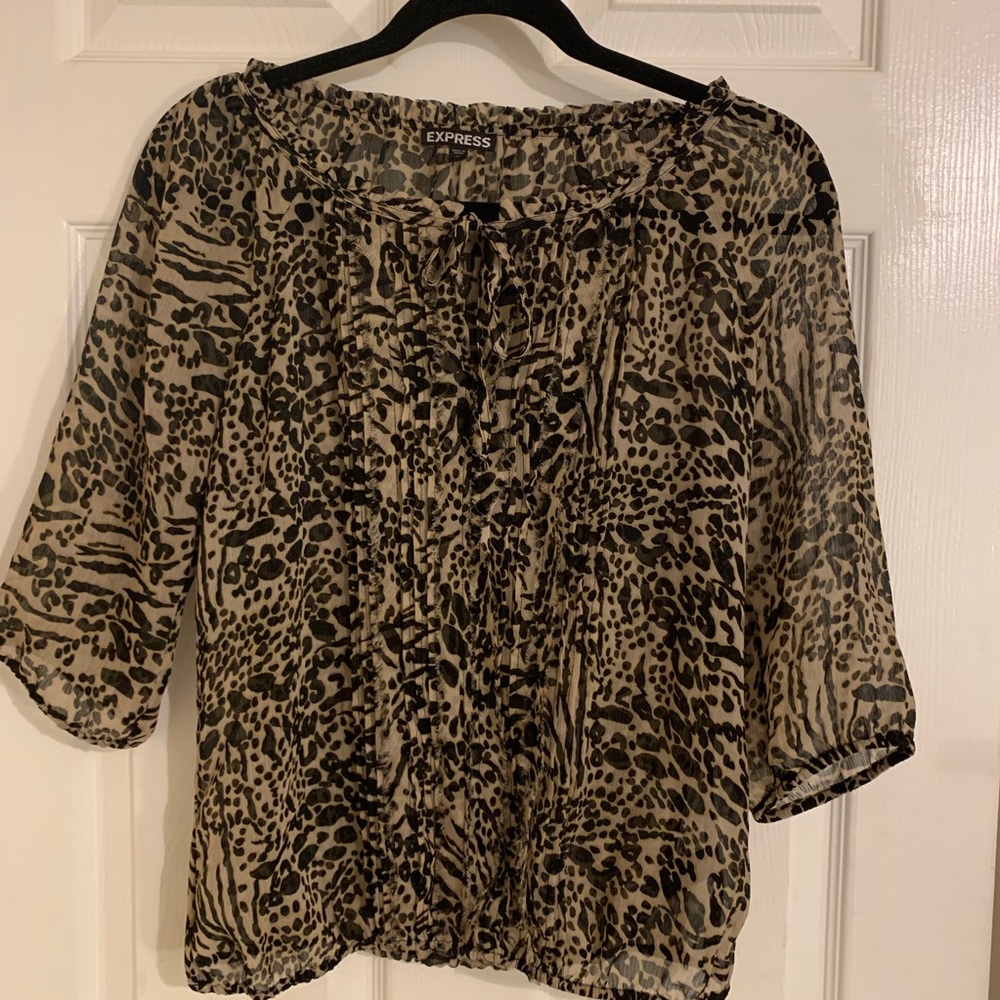 Express chiffon top with key hole neck.